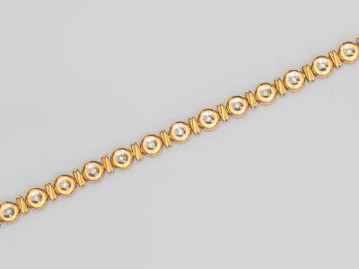 un bracelet en or et diamants
