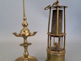 two different types of brass objects on a table