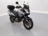 a picture of a motorcycle parked in a room