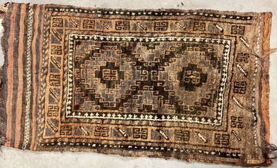 a close up of a rug on a floor with a white background