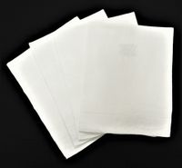 Suite de QUATRE SERVIETTES en coton damassé chiffré MBJ.