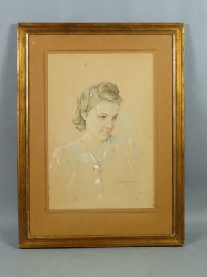 an old picture of a woman in a dress is shown