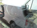 an image of a van that is parked on the side of the road