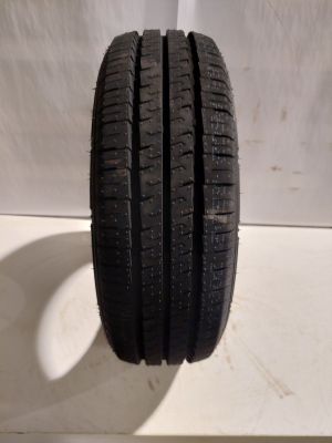 a close up of a tire on a white surface