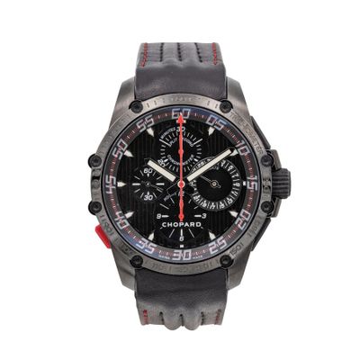 the watch is black and red with a red second hand