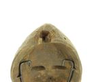 a wooden sculpture of a face on a white background