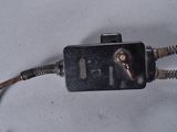 a close up of a wire connected to an electrical outlet