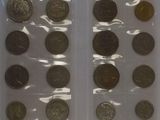 a lot of coins that are in a plastic bag