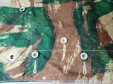 a close up of a piece of fabric with buttons on it