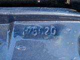 a close up of a car ' s emblem on the side of the car
