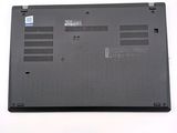 a black laptop with a small battery on it