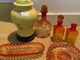a lot of glass items that are on the floor