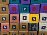 several boxes of chocolates stacked on top of each other in a store