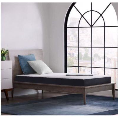 an image of a bed with a mattress on it in front of a window