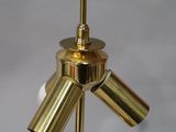 brass table lamp with three lamps on a metal stand