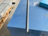 a blue box sitting on top of a blue table
