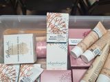 a plastic container filled with different types of skin care products