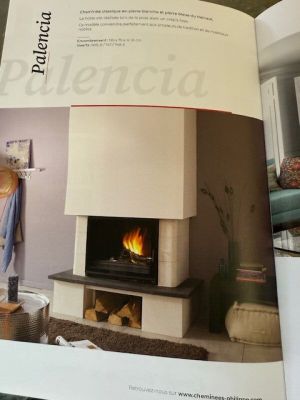 a book with a picture of a fireplace in the middle of it
