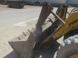 a picture of a backhoe of a construction vehicle