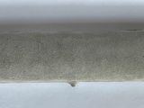 an image of a piece of concrete on a white surface