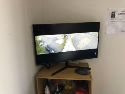 a television that is sitting on top of a shelf