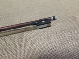 a pen that is laying on top of a piece of cloth