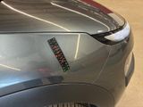 a close up of a car with a sticker on the front of it