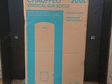 cardboard box sitting on top of a carton in front of a blue door