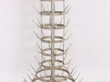 a metal rack with a bunch of spikes on it