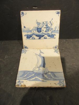 a small blue and white box with a boat on it
