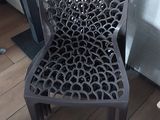 a chair that is sitting in front of a table