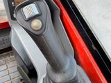 a close up view of a car ' s steering control