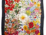 an image of a square scarf with a colorful floral design