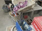 a pile of assorted items sitting on the floor