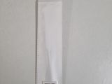 a white paper bag that has a barcode on it