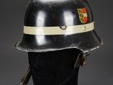 a black helmet with a white stripe on the side of it