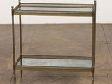 an image of a metal and glass shelf on a parquet floor