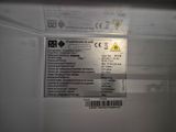 a label on the back of a microwave oven