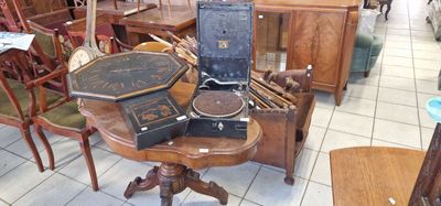 a table with a lot of antique items on it