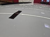 a remote control on the hood of a car
