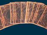 a picture of a set of six cards with gold foil on them