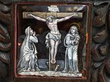 a picture of jesus on the cross with other people