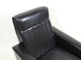 a black recliner chair with a black seat and back rest