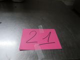 a pink piece of paper with the number 24 on it