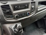 a dashboard of a car with a steering control