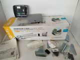 a box of electronic items sitting on a table