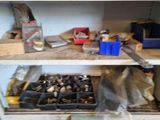 a shelf full of tools and other items in a room