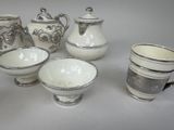 five different types of coffee pots and cups on the table
