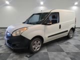 a picture of a white van parked in a garage
