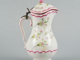 an image of a white and pink pitcher with flowers on it
